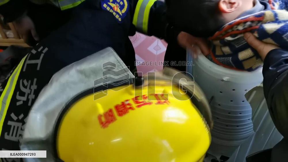 GLOBALink | 4-year-old boy rescued after getting stuck inside washing machine in E China