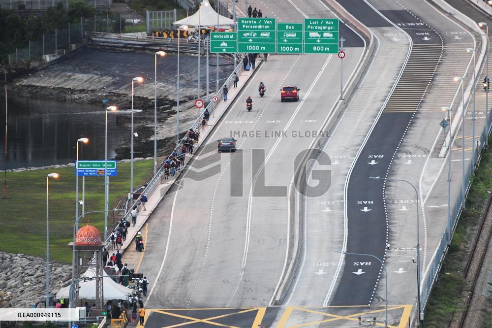 SINGAPORE-MALAYSIA-BORDERS-REOPEN