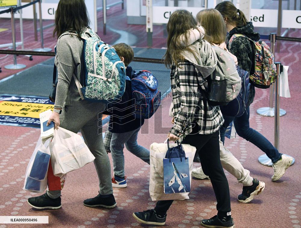 Ukrainian evacuees arrive in Japan from Poland