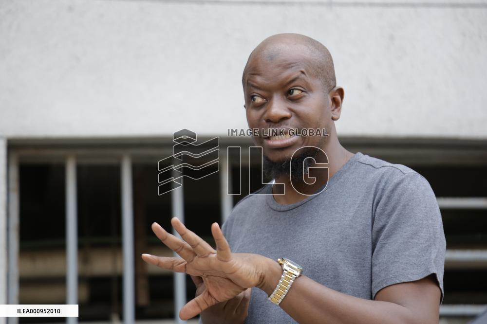 TANZANIA-DAR ES SALAAM-CARTOONIST-CUM-RADIO PRESENTER-ELECTRIC CAR-MAKING