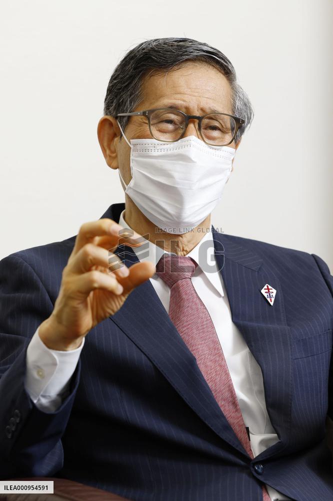 Japan's top coronavirus adviser Shigeru Omi