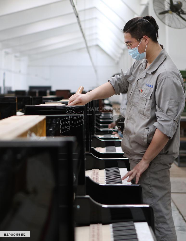 CHINA-LIAONING-YINGKOU-PIANO MAKING-RESUMPTION (CN)