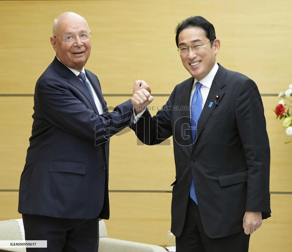 Japan PM, WEF chief