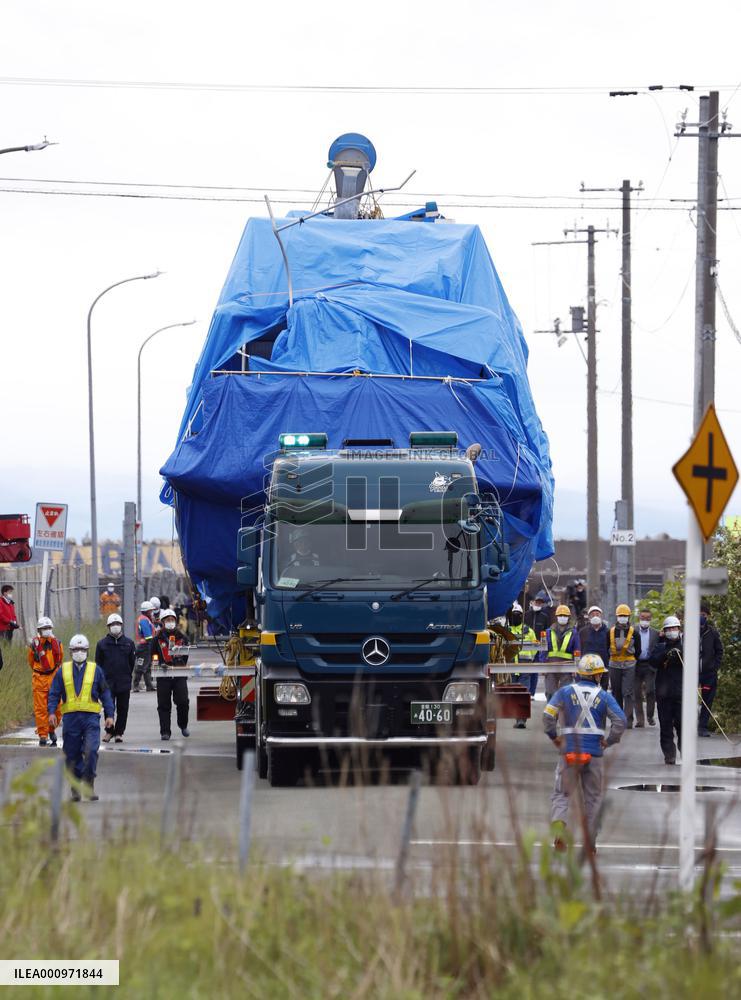 Sunken tour boat brought ashore at Hokkaido port