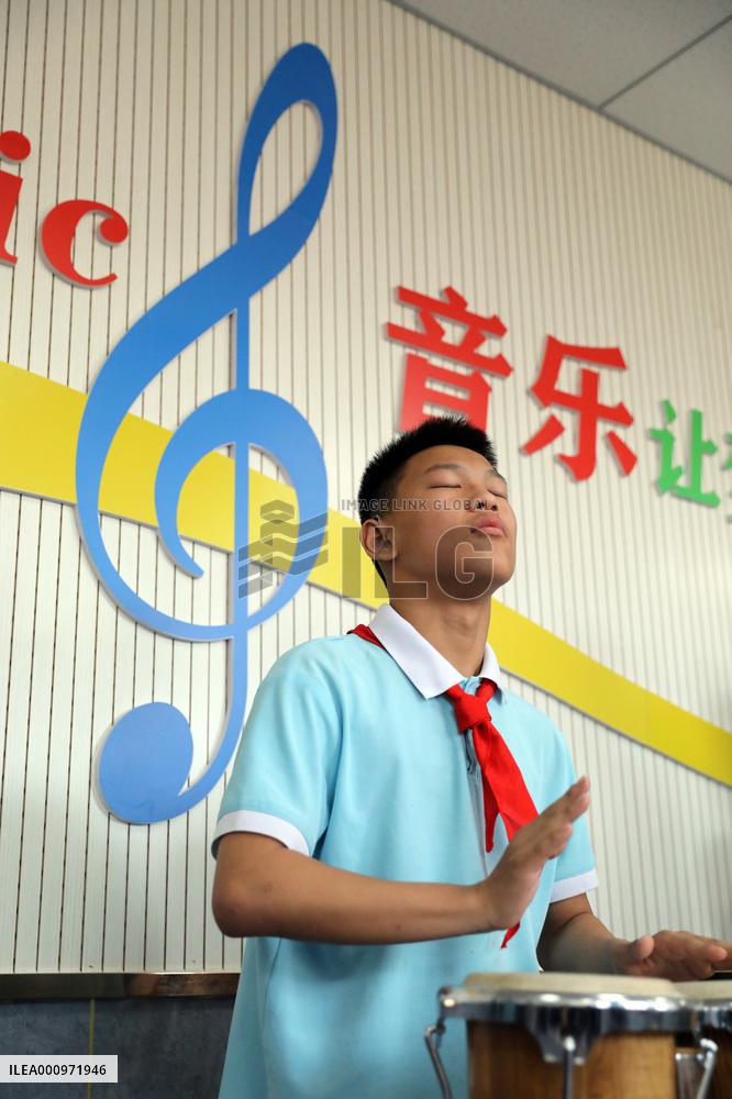 CHINA-HEBEI-XINJI-SPECIAL-EDUCATION SCHOOL JAZZ DRUMMING BAND (CN)