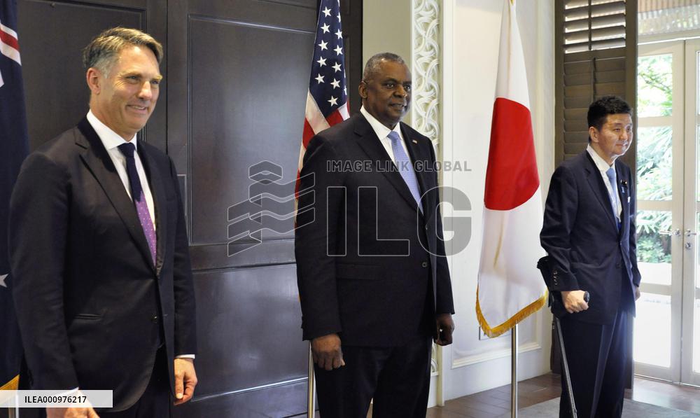 Japan, U.S., Australian defense chiefs meet in Singapore