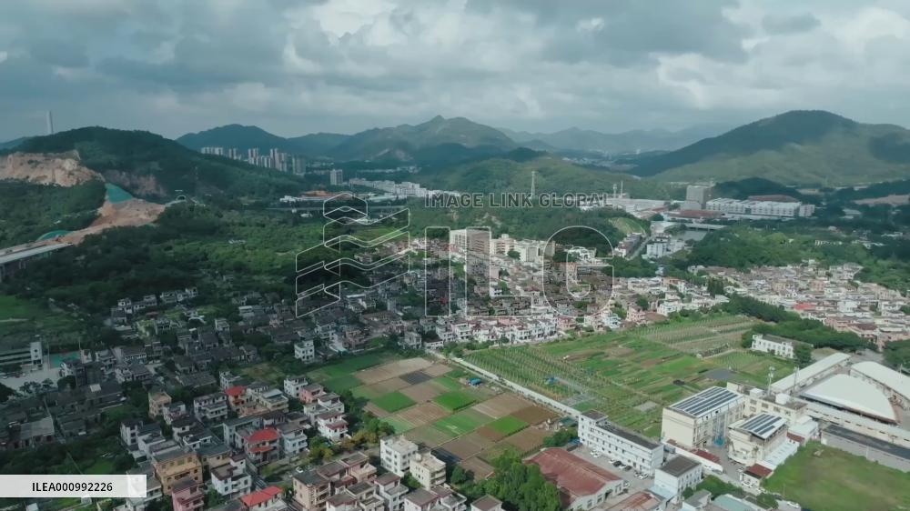 Brazilian musician experiencing traditional village life in S. China