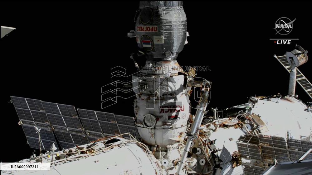 Russian and Italian astronauts conduct joint spacewalk to activate robotic arm