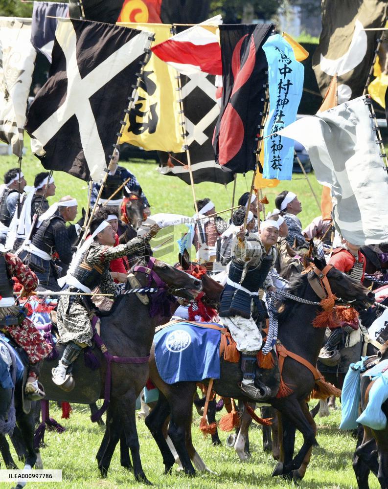 Armored warriors compete in horse race