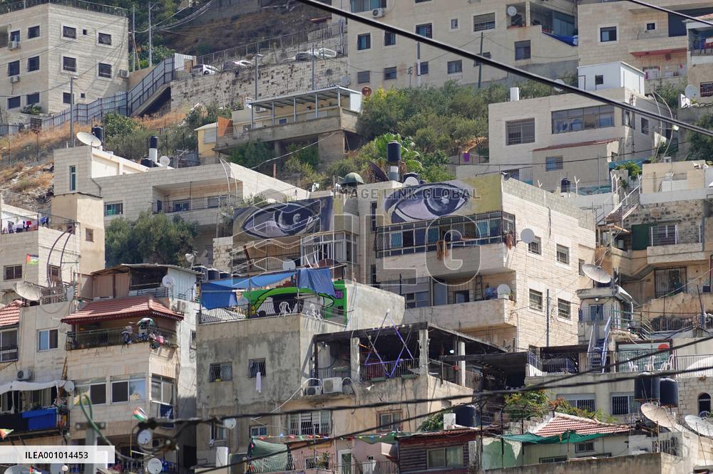 MIDEAST-JERUSALEM-SILWAN-MURALS