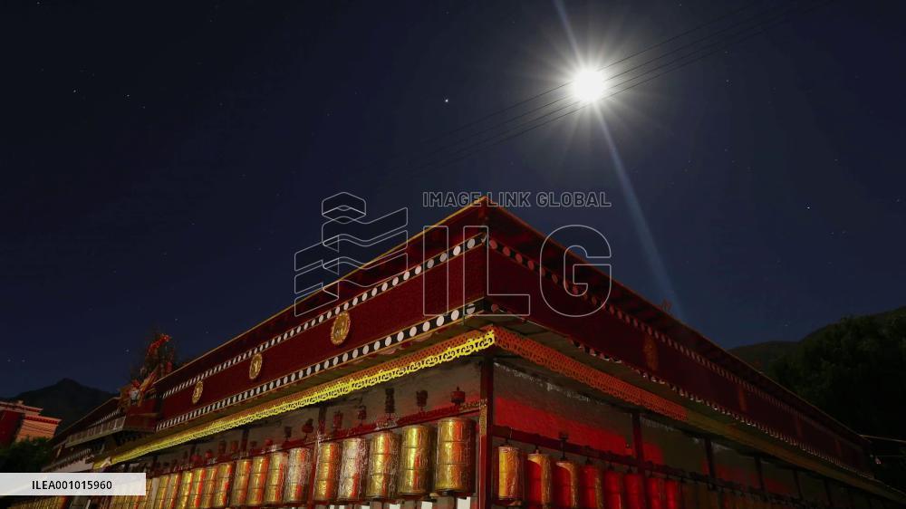 Full moon illuminates night sky in China's Tibet