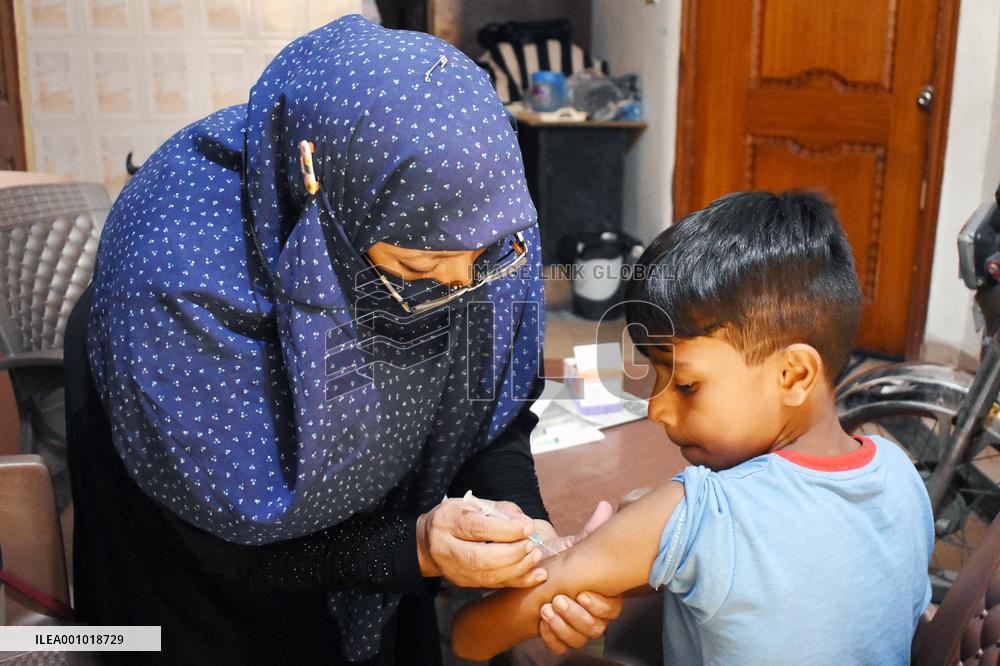 PAKISTAN-LAHORE-COVID-19-CHILDREN-VACCINATION
