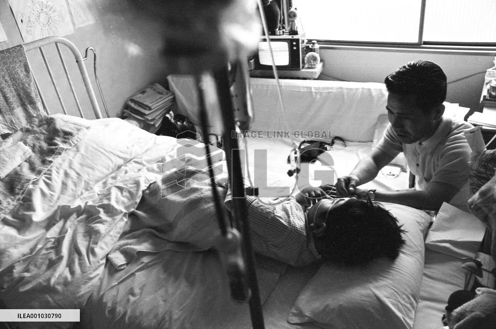 Death of a Second-Generation Atomic Bomb Victim