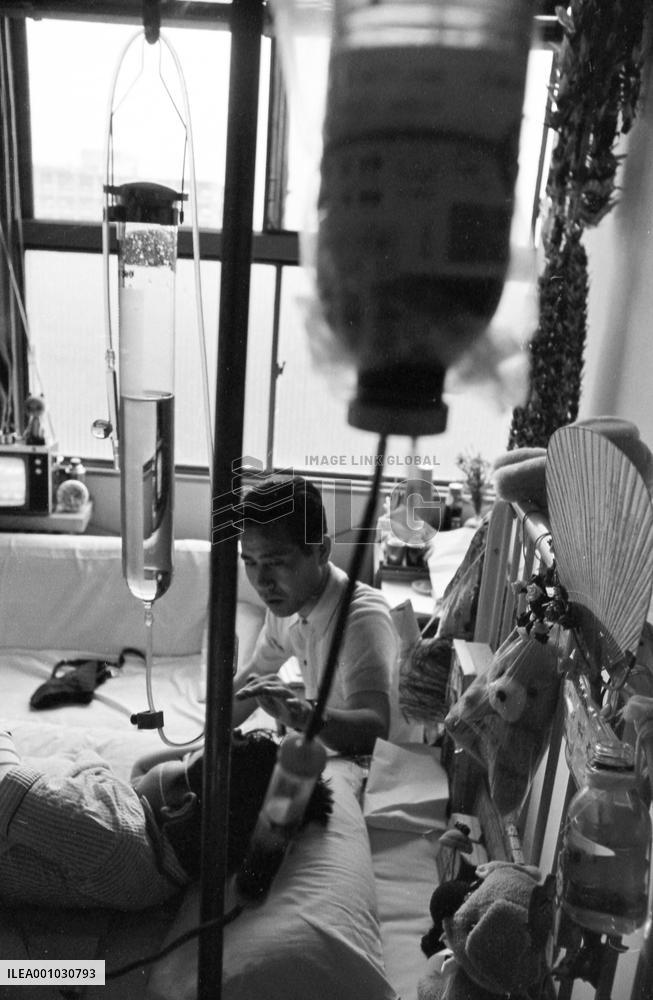 Death of a Second-Generation Atomic Bomb Victim