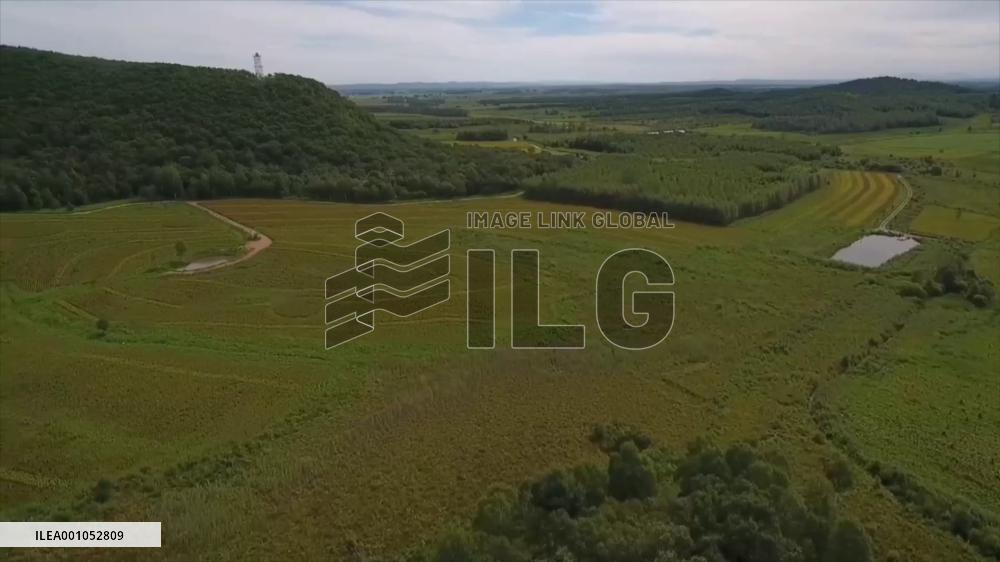 Geological tourism of huge crater in NE China