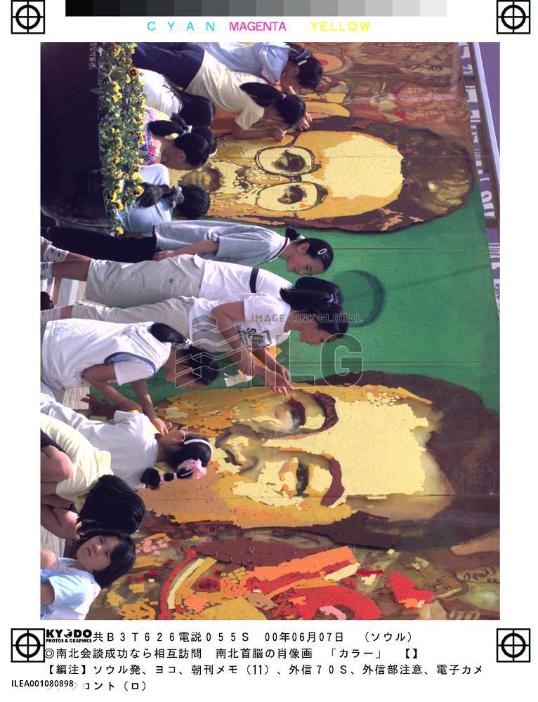 Portraits of North and South Korean leaders appear in Seoul