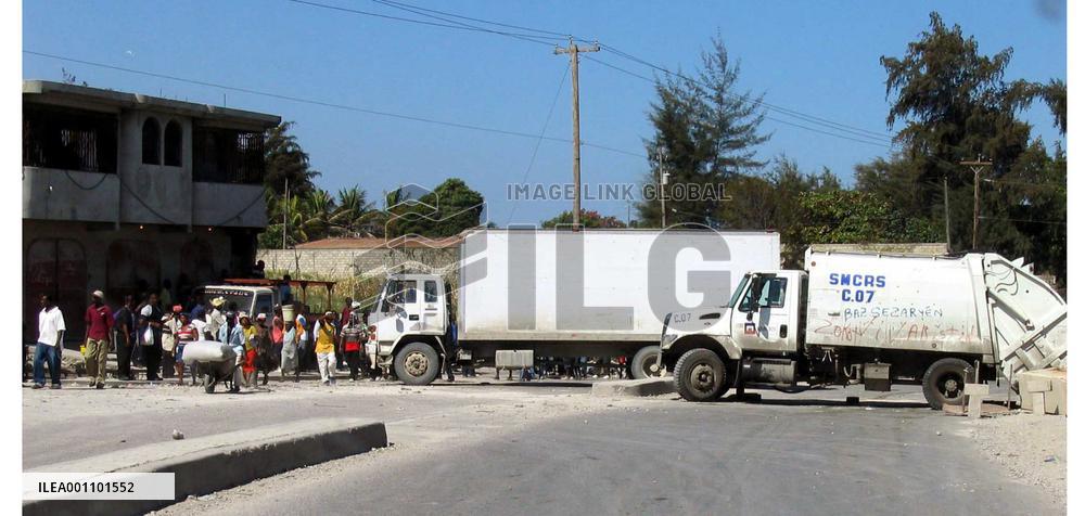 Japanese embassy staffers evacuate rebellion-hit Haiti