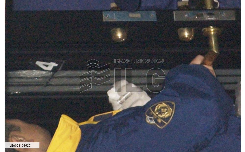 Police suspect bullets fired at home of Aso's secretary