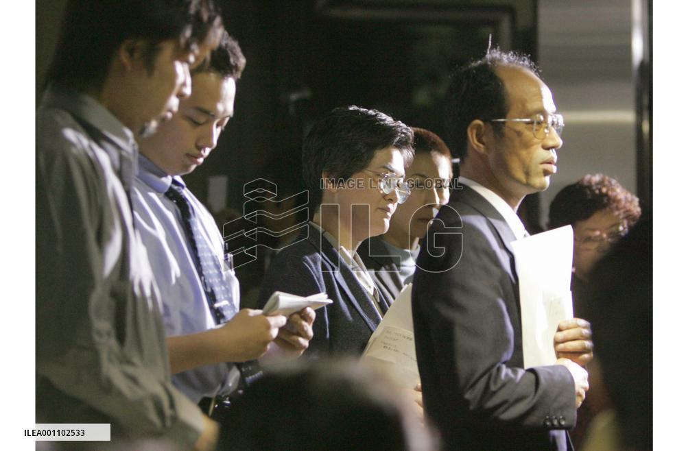 (2)Families exhausted after waiting for word on hostages