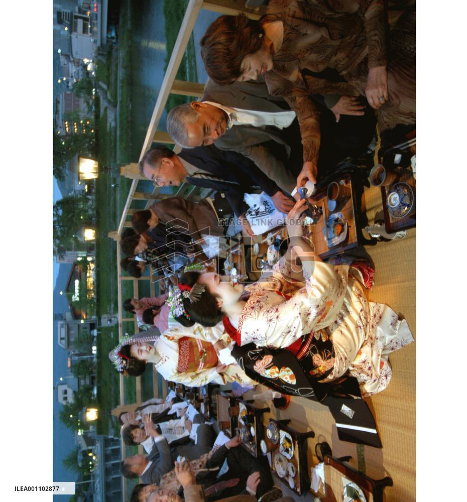 Kyoto teahouses open riverside seats for summer