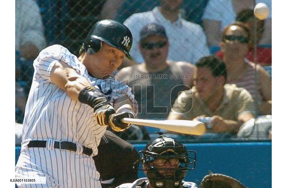 Matsui drives a grand slam at Yankees Stadium