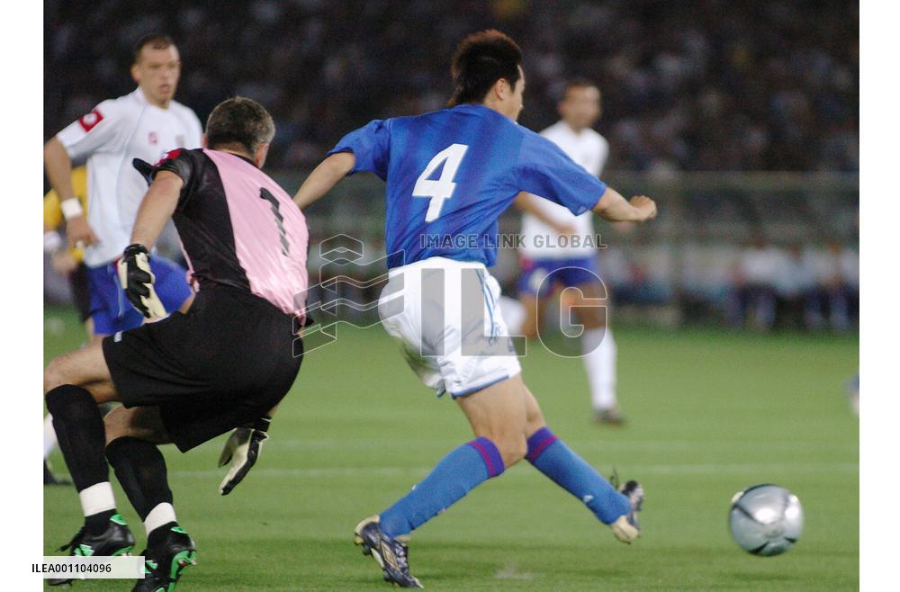 (1)Japan edges Serbia-Montenegro