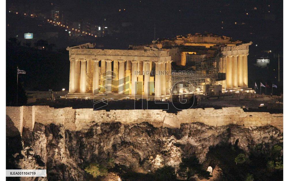 (1)Torch in Athens, Lewis carries flame toward Acropolis