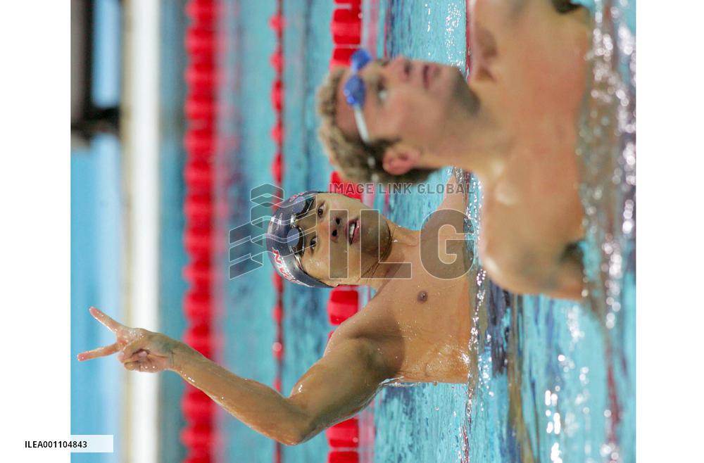 (6)Kitajima wins gold in 100m breaststroke