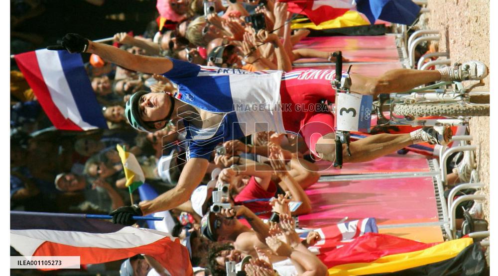 (1)France's Absalon wins men's cross country in Olympics