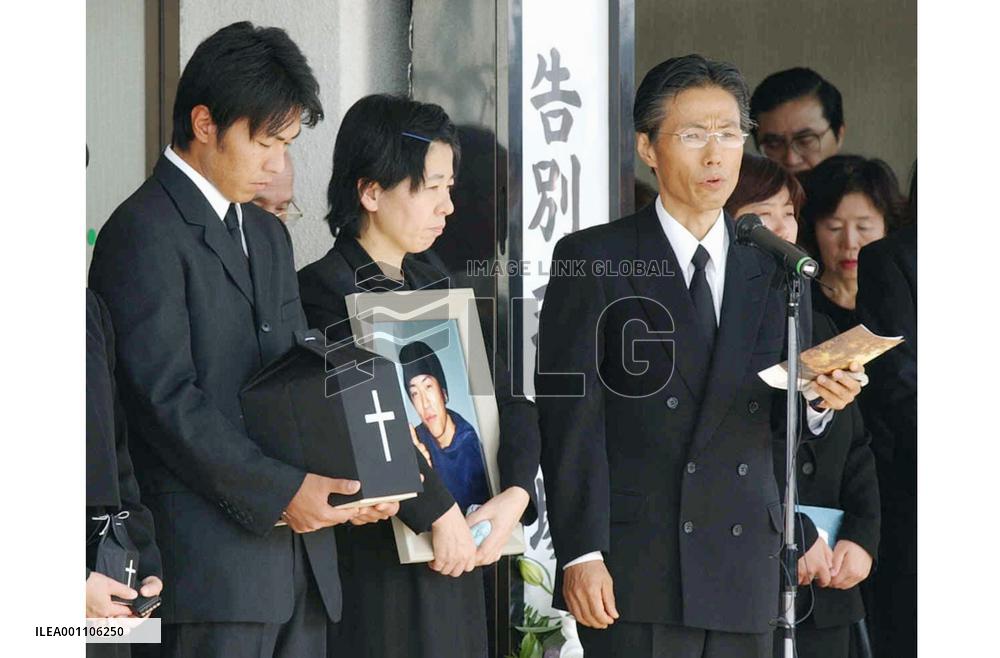 Family holds funeral for slain hostage Koda
