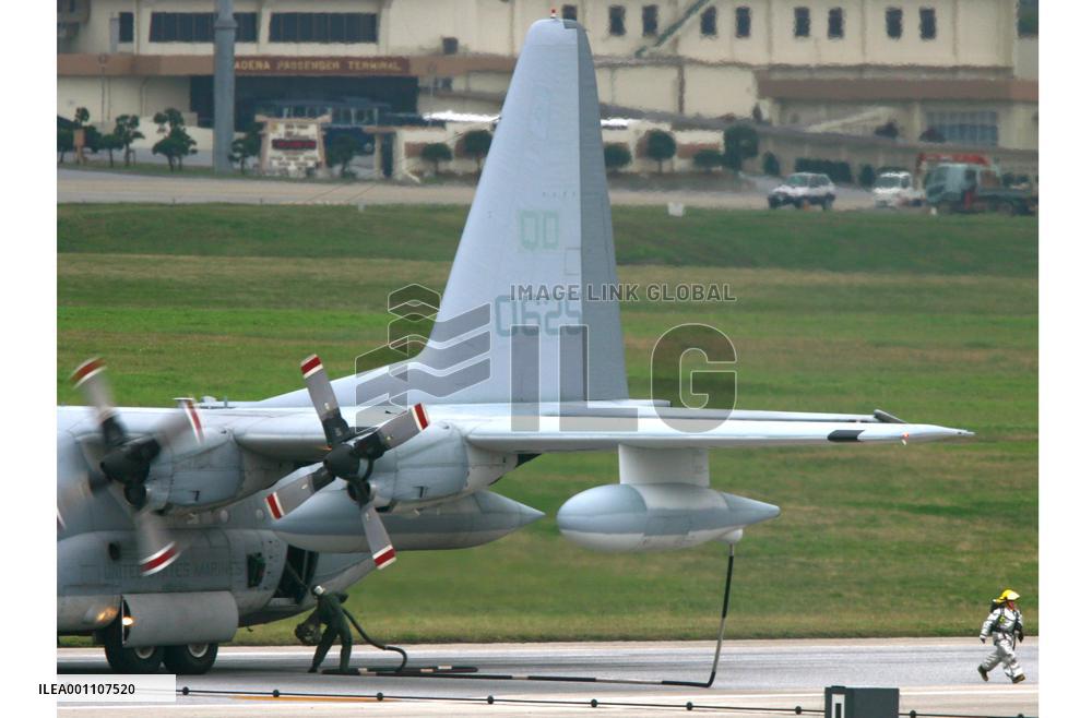 U.S. Marine plane drags fuel hose on runway in landing in Okinawa