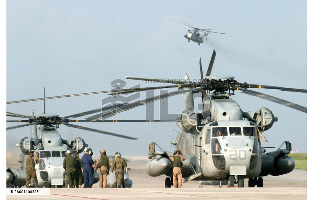 U.S. Marine choppers return to Okinawa from Iraq