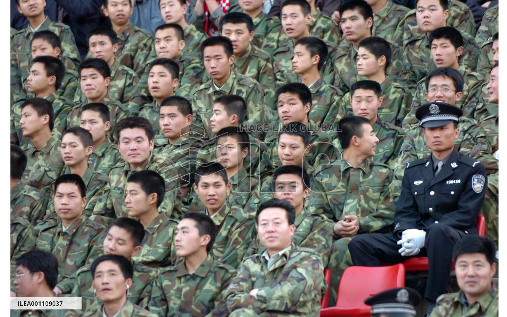 (3) China police on high alert at Japan-China soccer match