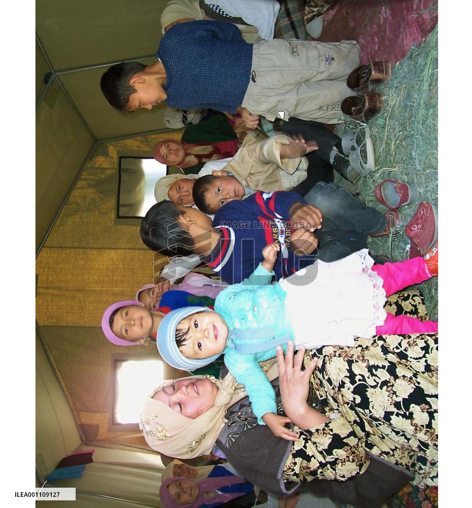 (1)Uzbek refugees say they will never reutrn