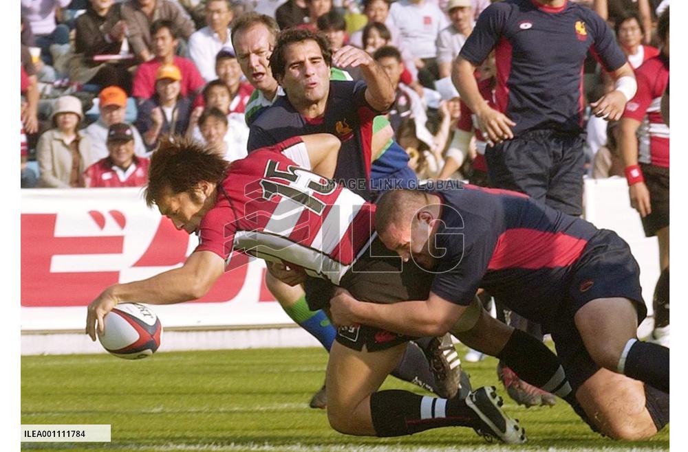 Japan romps over Spain in 1st victory for Elissalde