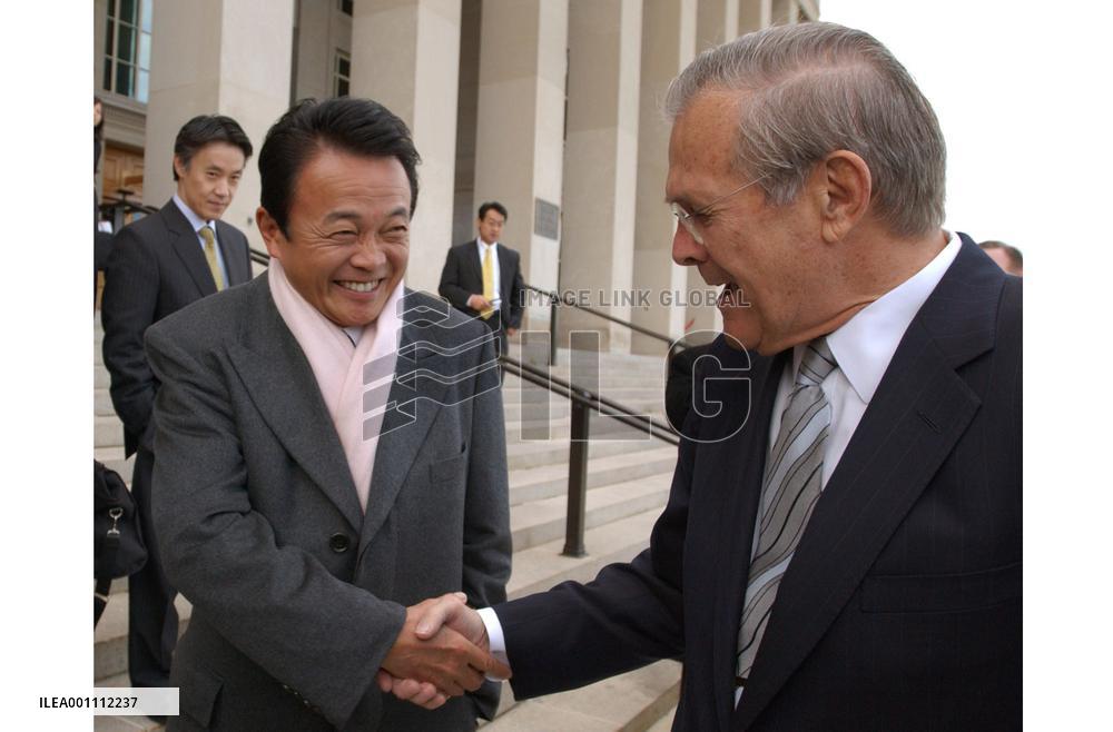 Aso, Rumsfeld reaffirm efforts to implement base realignment