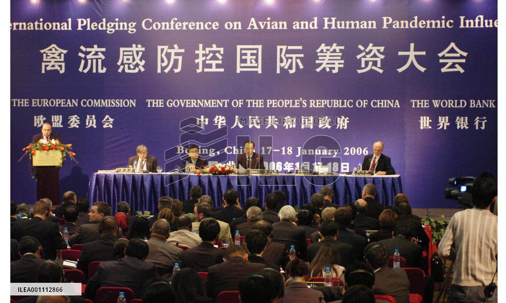 Donors at Beijing bird flu funding conference pledge $1.9 bil.