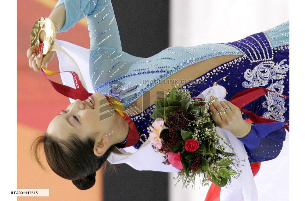 Arakawa wins gold in women's figure skating