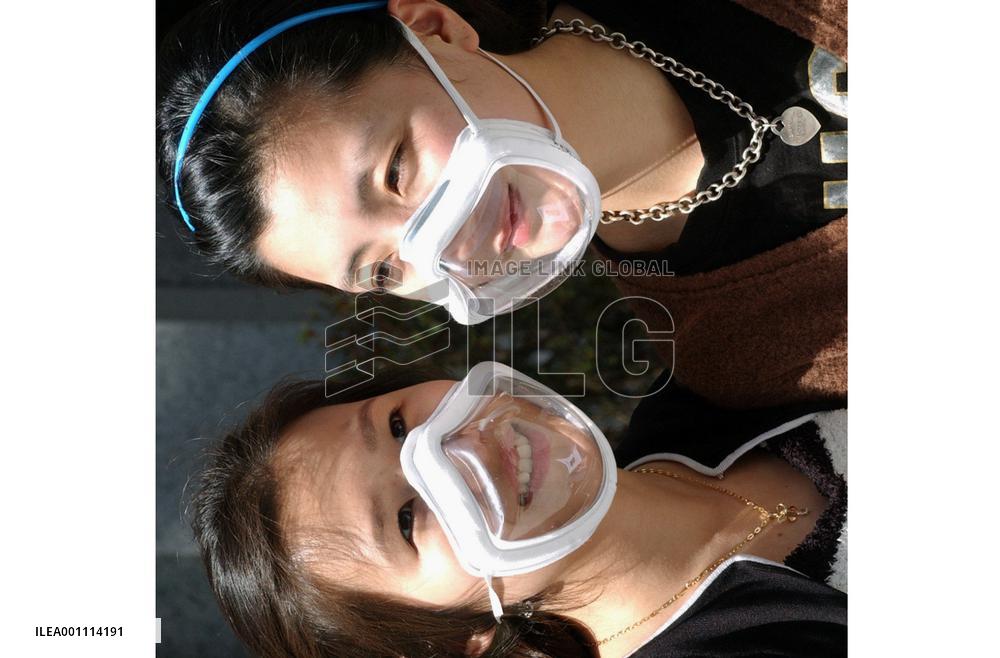 Transparent masks put on sale for protection from yellow sand