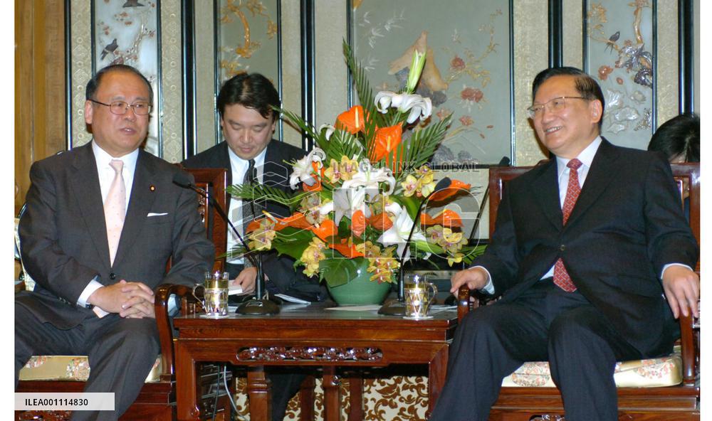 Tang says will make efforts to help resolve abduction issue