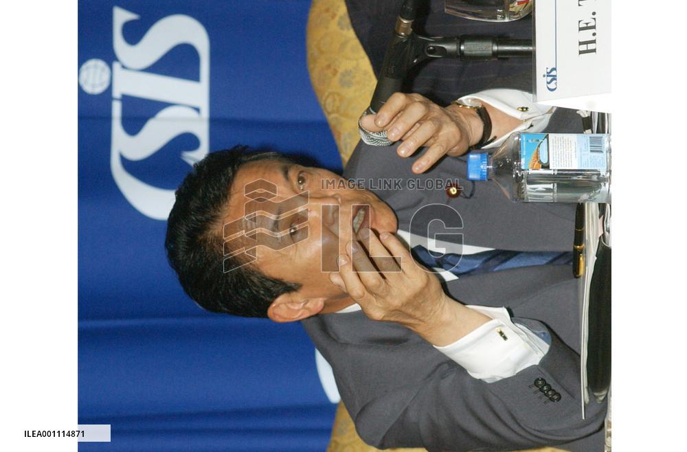 Aso urges China to democratize, warns against nationalism