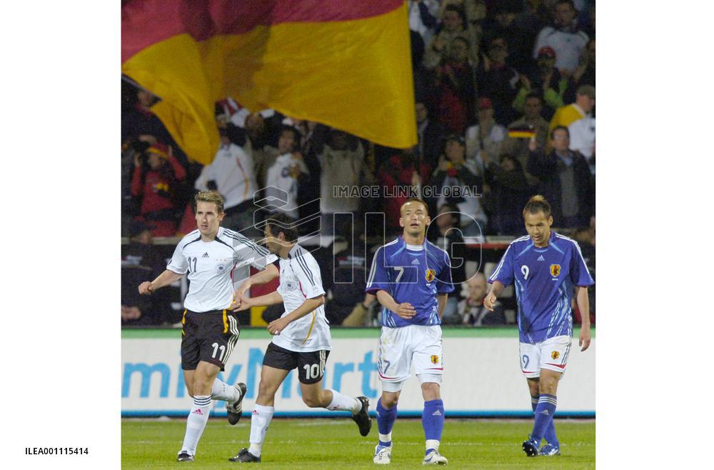 Japan hold World Cup hosts Germany to 2-2 draw
