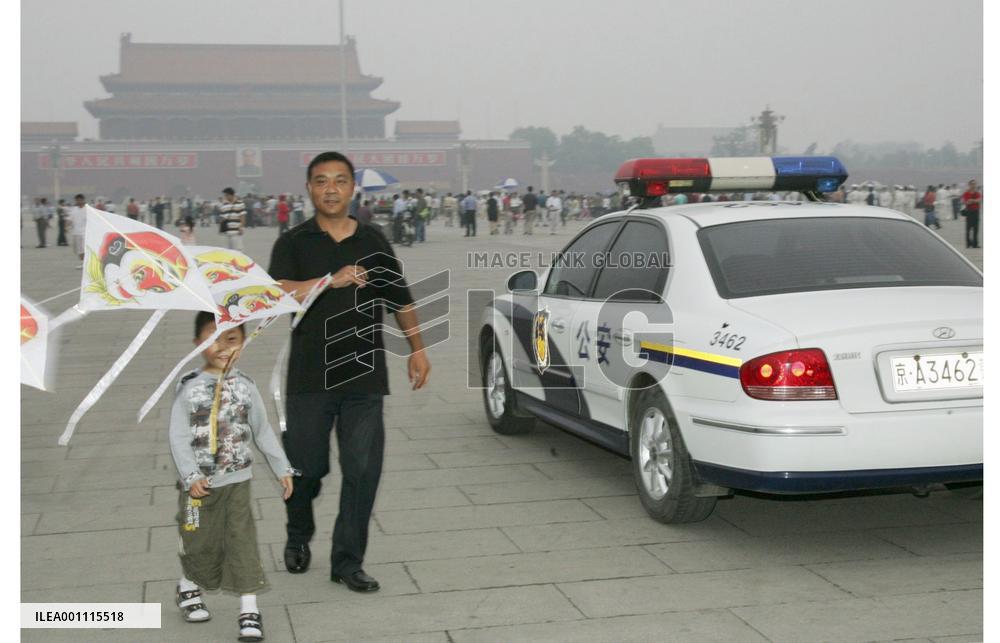 Police keep watch at Tiananmen Square on 17th anniversary
