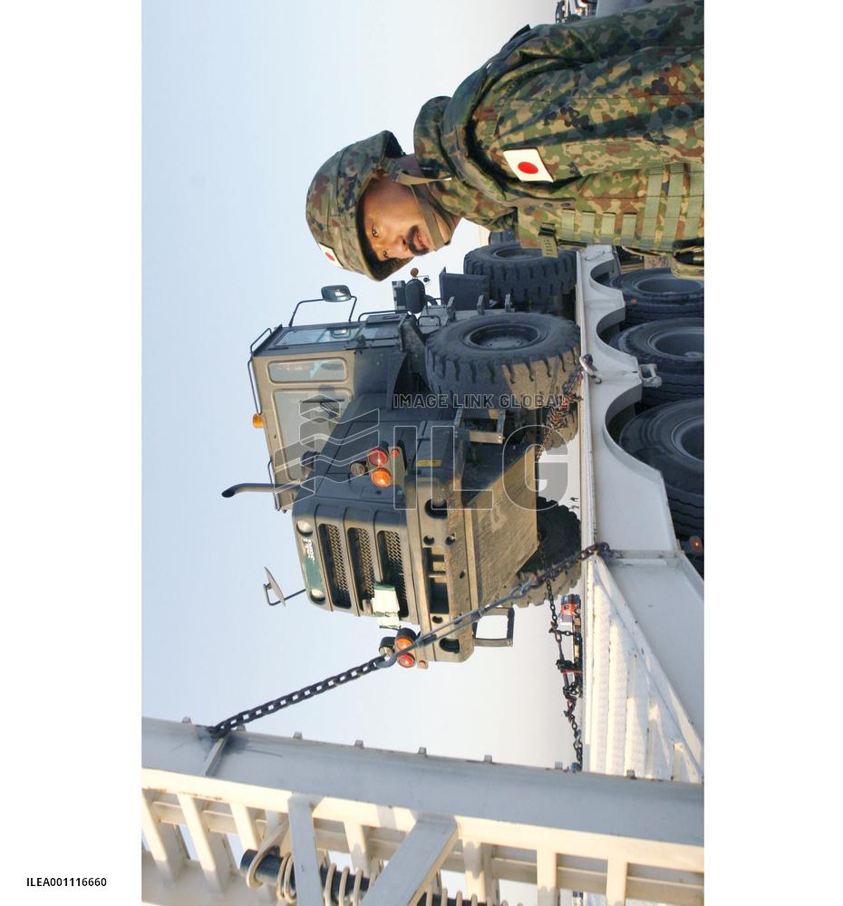 GSDF armored trucks leave Iraq's Samawah for Kuwait