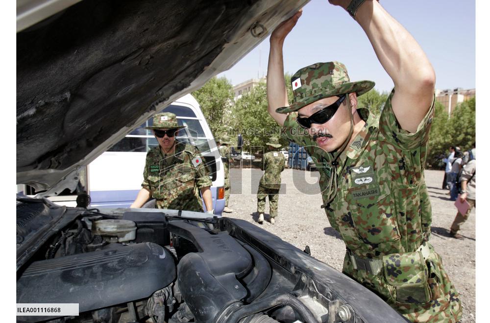 Japanese ground troops prepare for pullout