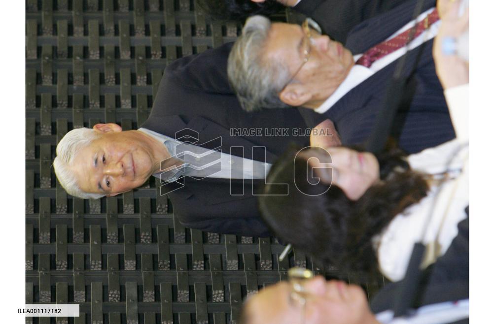 BOJ chief upbeat on economic outlook, mum on rate hike