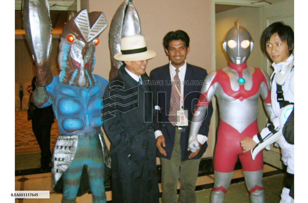 Aso performs with Ultraman