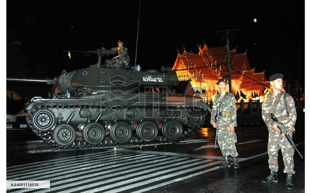 Military seizes power in Thailand in coup, ousts Thaksin