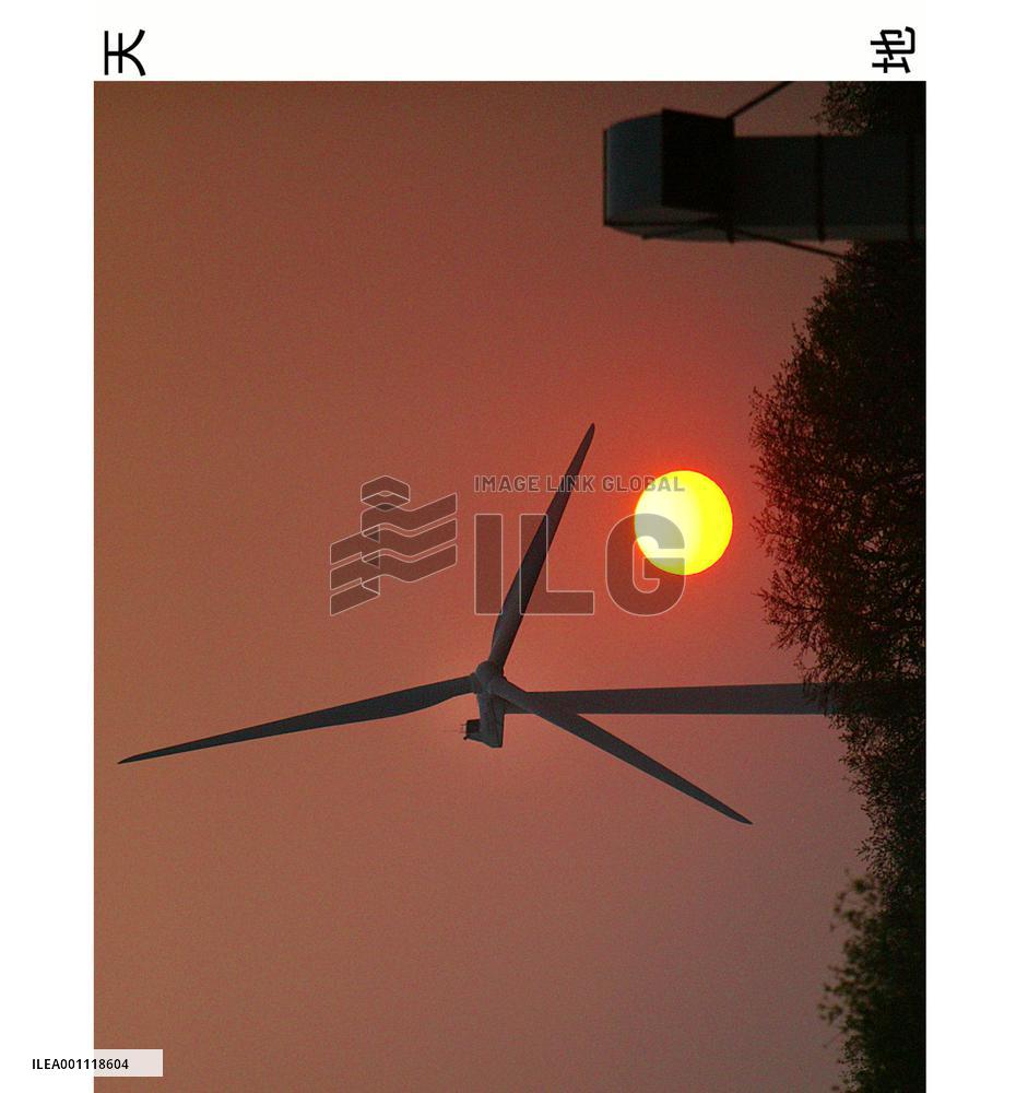Windmills become symbols of citizens' campaign against pollution