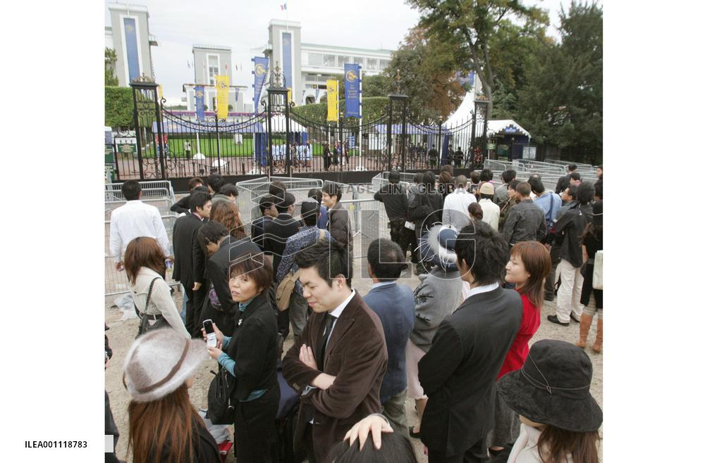 Japanese visitors at Longchamp racecourse